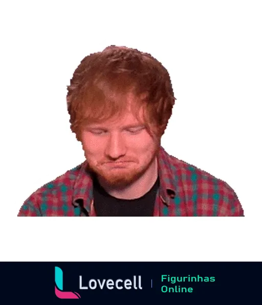 Figurinha de Ed Sheeran desapontado, com a testa franzida e olhos fechados, usando camisa xadrez colorida