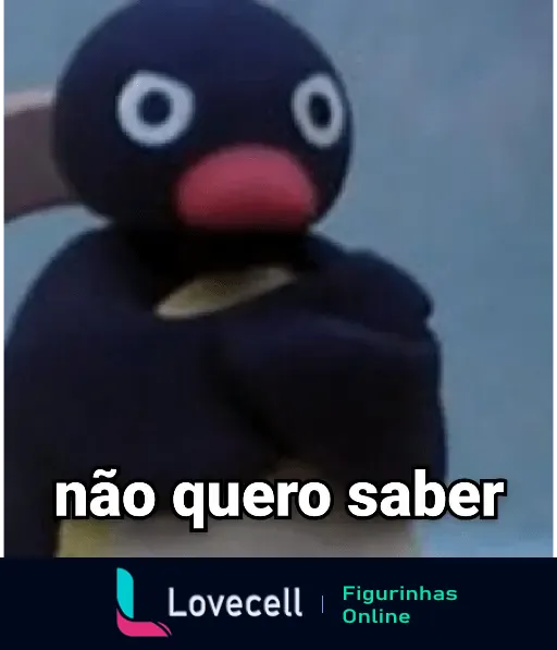 Imagem do personagem Pingu com uma expressão brava e os braços cruzados, acompanhado do texto 'não quero saber'. Ideal para situações de desdém.