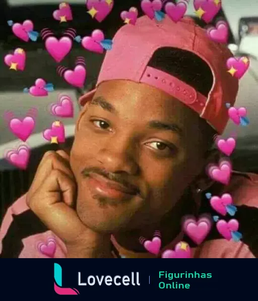 Will Smith sorrindo e apoiando o rosto com a mão, cercado por corações pink, transmitindo amor e alegria. Figurinha destaca emoções positivas.