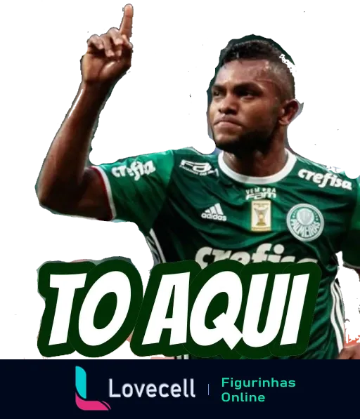 Figurinha de jogador de futebol do Palmeiras comemorando e apontando para cima, vestido com o uniforme do time, texto 'TÔ AQUI' em destaque