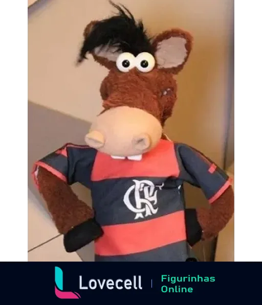 Figurinha do mascote do Flamengo, um burro de pelúcia com camisa rubro-negra e expressão divertida, vestindo uma camisa com emblema do clube