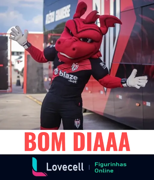 Figurinha de bom dia com o mascote do Atlético-GO, um dragão vestido com o uniforme preto e vermelho do time, celebrando antes de um jogo