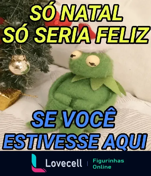 Figurinha de Natal mostrando uma marionete de sapo sentado ao lado de uma árvore de Natal, com a frase 'Só Natal só seria feliz se você estivesse aqui'.